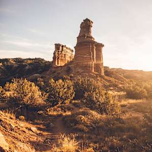 When you come through the brush and crest a hill the Lighthouse Rock formation rises out of the desert to greet you.
