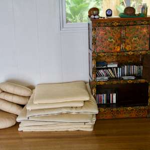 yoga mats and meditation cushions. Iris, one of the hosts, is a yoga instructor.