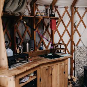 Great little kitchen with everything you need. And they fill up the water container on top so you can have drinking water and water to clean the dishes with.