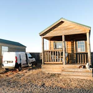 The cabins are lined up in a row.
