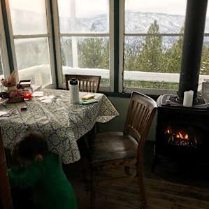 Breakfast table with toasty fire!