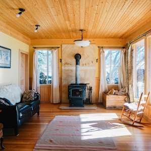 The old farmhouse has been updated recently and the interior is modern and beautiful, while retaining the charm of cabin living. Wood throughout the house makes it feels very warm and inviting.