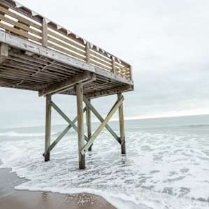 Watching the waves roll in, in the nearby town of Edisto Beach.
