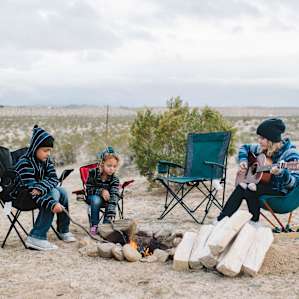 people campfire desert