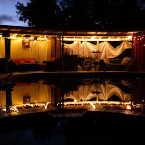 The cabana area at night.