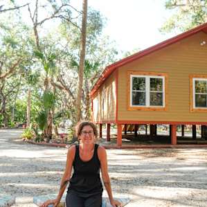 Caroline and the main house behind her.