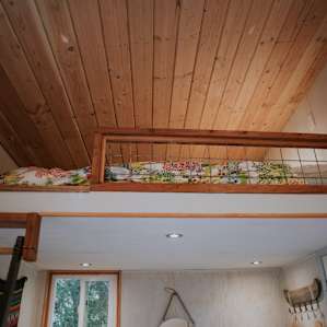 Queen bed loft area.