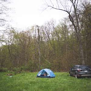 Girls ran into the tent once it started raining.