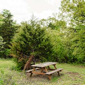 And a picnic table, perfect for eating meals, using to roast s'mores, or just to relax and enjoy good conversation with friends.