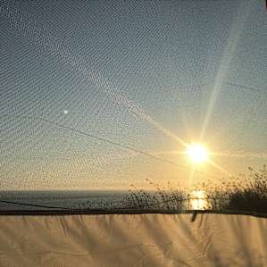 A great way to end the day - ocean view sunset from your tent!
