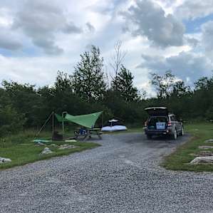 Site 1. Lucky to grab this site late in the afternoon on a holiday weekend. This site is very exposed and gets toasty in the sun. There are better sites if you arrive early.