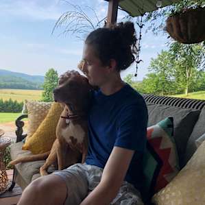 Henry, the world’s friendliest dog, on the porch