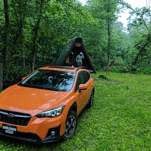 Our brand new subaru crosstrek (AWD) made it down and 9/10ths of the way backup and Farmer Mike was more than happy to bring his tractor over and tow us out, which made us safe to try out our new baby. ;-)