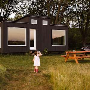 Close easy picnic table that won't leave you far from the indoor kitchen area.