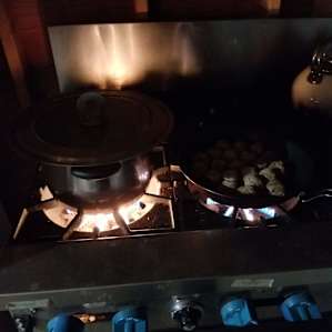 Cooking pasta and meatballs at the Lanai, using their pans