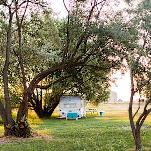 Adorable vintage camper on the property