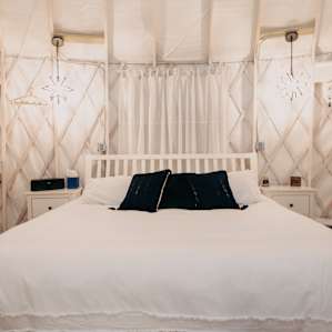 The cozy bedroom area.