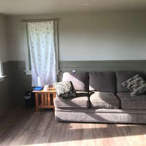 Interior of the tiny house. The couch pulls out.