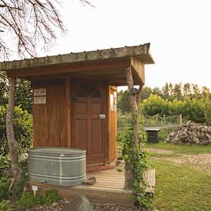 The most, dare I say, beautiful outhouse you will ever lay your eyes on.