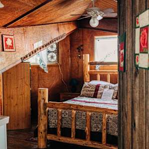 Log bed and a comfy mattress were the perfect touch.