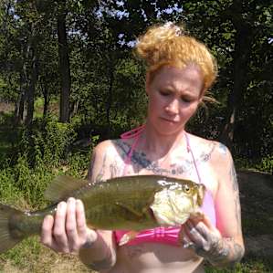 That's me. Terrible picture lol. I caught that fish he was heavyy
