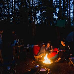 forest people campfire