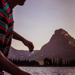 Skipping rocks on Two Medicine Lake
