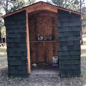 The only two seater out house I have ever seen in my life.