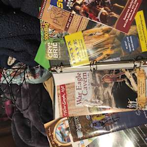 Ashlie gives each camping site a notebook of emergency contacts and pamphlets for fun things to do.