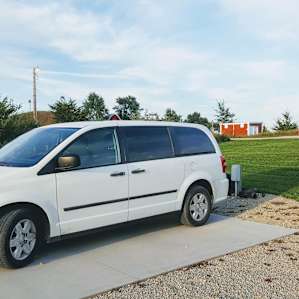 Our van, Darla, parked just below the cabins and bathrooms.