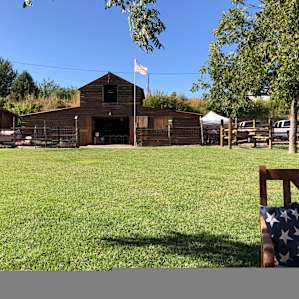 The barn retreat with laundry, microwave, refrigerator, coffee maker, snacks, games, and wonderful gathering place for campers.