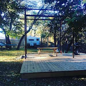 RV and Deck area for yoga/meditation overlooking the lake