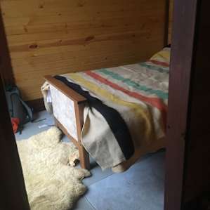 one of the sleeping areas in the cabin