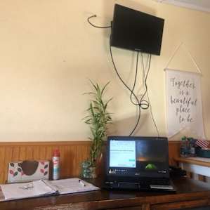 a small desk provides the perfect work space should you need it, and there's a tv visible from the bed and couch