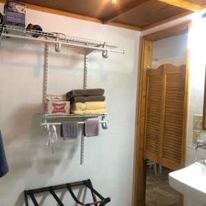 plenty of linens and towels and toiletries in this spacious bath