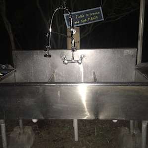 large utility sink to wash your dishes in the outdoor kitchen area