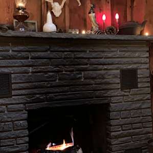 Cozy living room. Lots of wood for a fire.