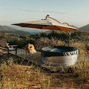 a little walk takes you to one end of their property where they have a stock tank pool that's lightly chlorinated and filtered. another perfect spot to watch the sun set as you cool off on a warm day.