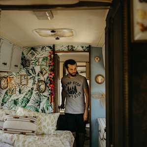 bathroom at the end of the trailer into the bedroom.
