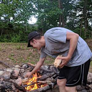 Sean tending to the fire