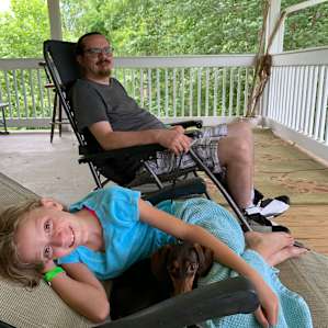 Hanging out on Jim and Loras beautiful porch waiting on storms to pass