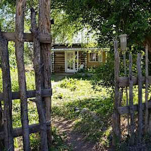 The front of the D.H. Lawrence cabin from the parking area