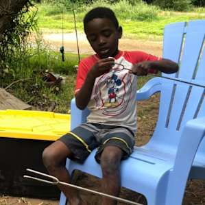 A boy's first fishing trip