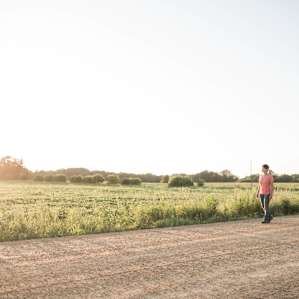 The dirt road is quiet and perfect for a peaceful sunset walk