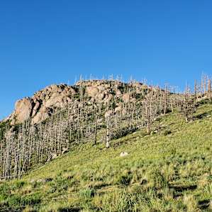 Rock outcropping and Sierra Blanca from the watchtower (copyright Jeff Rauland)