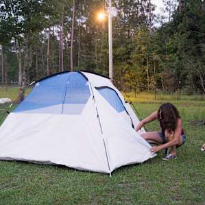 Setting up the tent for the night.