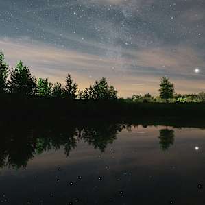 Mirroring pond at night