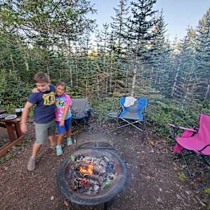 Our private fire pit. There are two propane pits in the covered area and one large public pit that Amy lit for us the first night.