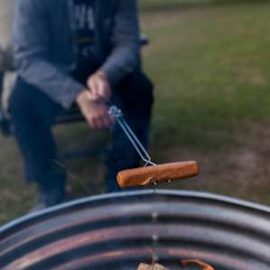 Cook over the campfire as the sun goes down.
