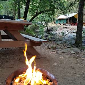 #6 tent site (glamping site in background across stream)